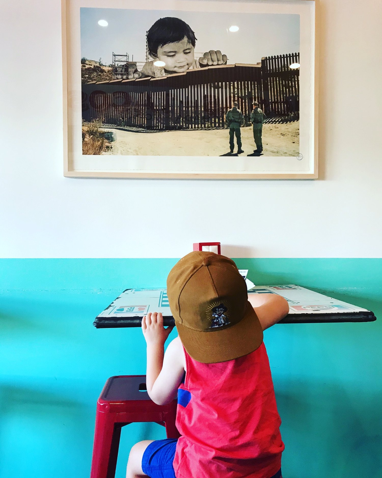 A quiet moment at Otro Día’s turquoise counter